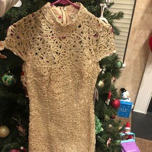 Gorgeous woman’s  gold dress